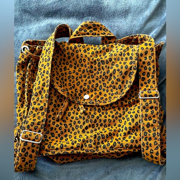 BAGGU Handbags - BAGGU cheetah print canvas backpack excellent condition